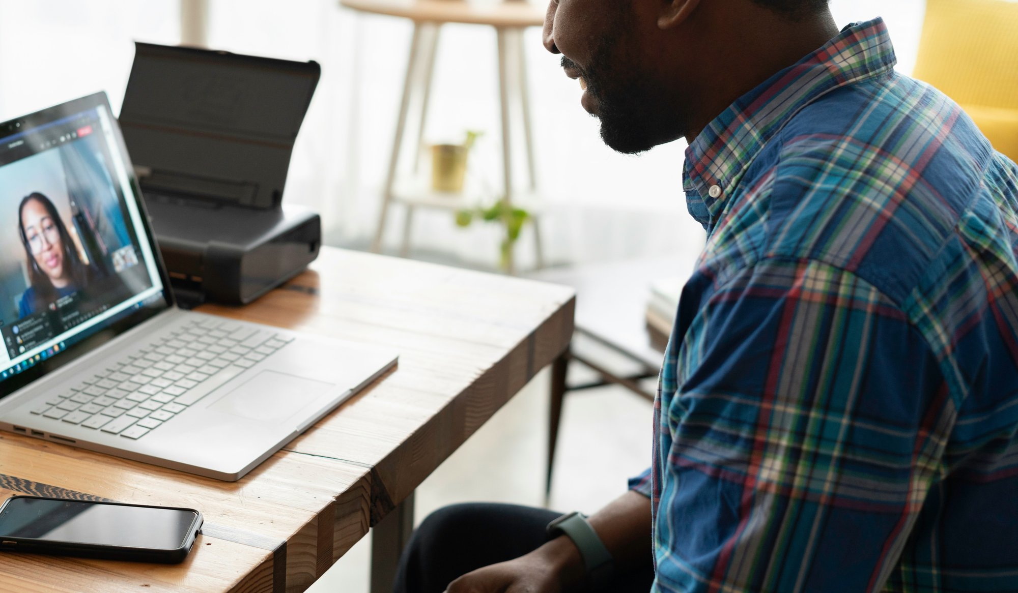 a man and woman on video call with each other